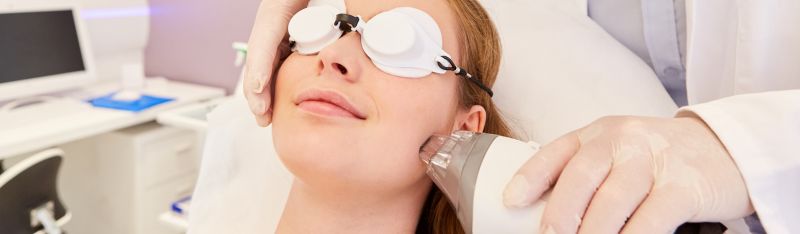 A patient undergoing advanced laser treatment at a professional laser clinic to treat severe acne issues for clearer skin.