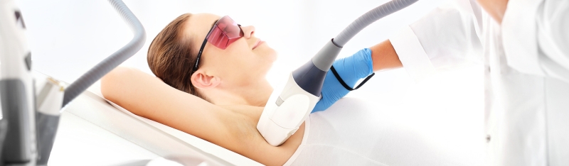Laser hair removal treatment on dark skin showing safe hair reduction process